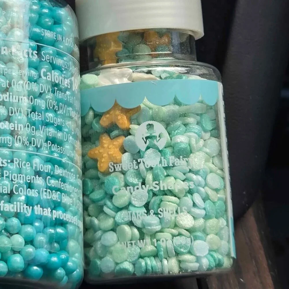 Mermaid tail cake toppers woth 2 jars of sprinkles. New in box Mermaid birthday